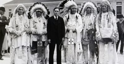 Commissioner of Indian Affairs John Collier meets with South Dakota Blackfoot Indian chiefs in 1934